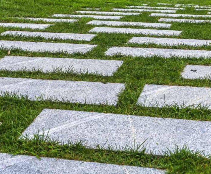 Decorative stone wall and garden feature installation